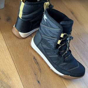 Sorel Black and Gold Snow Boots